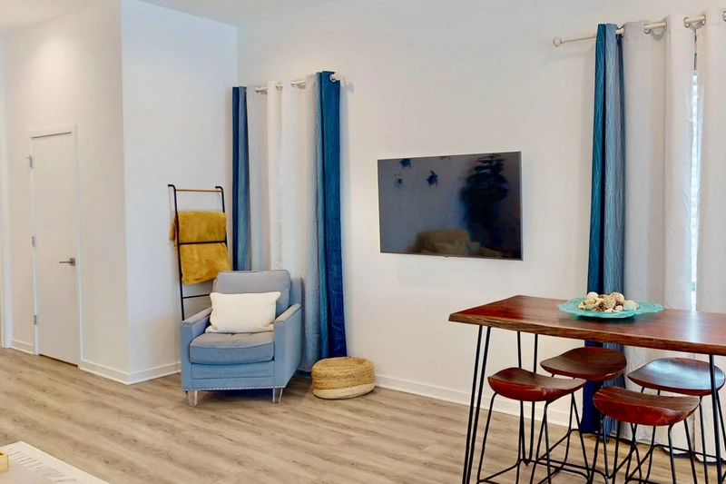 Catch the game or your favorite movie in the modern living area