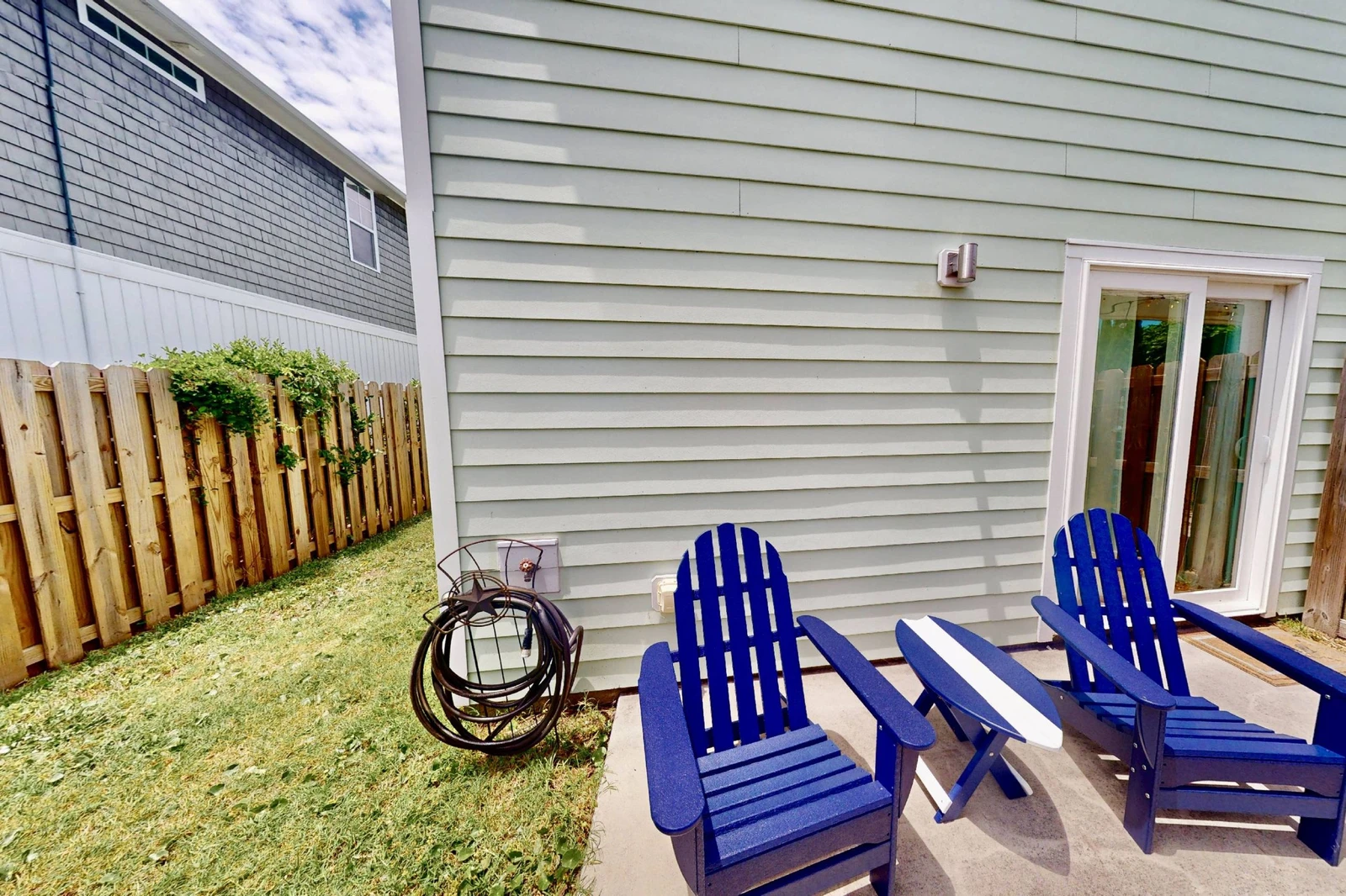 Relax while the kids play in the fenced back yard