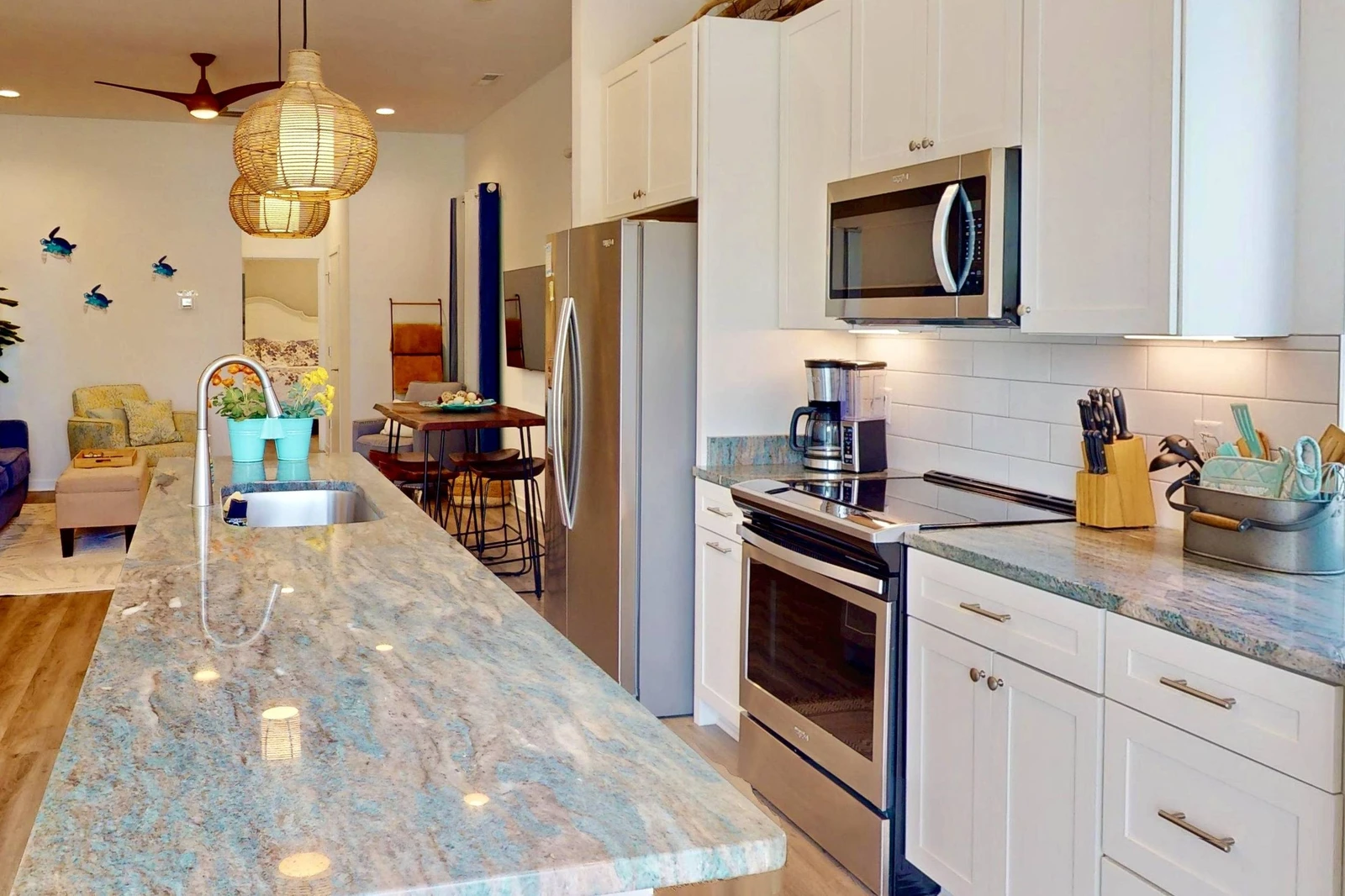Enjoy the stunning counter tops and huge island in this modern kitchen