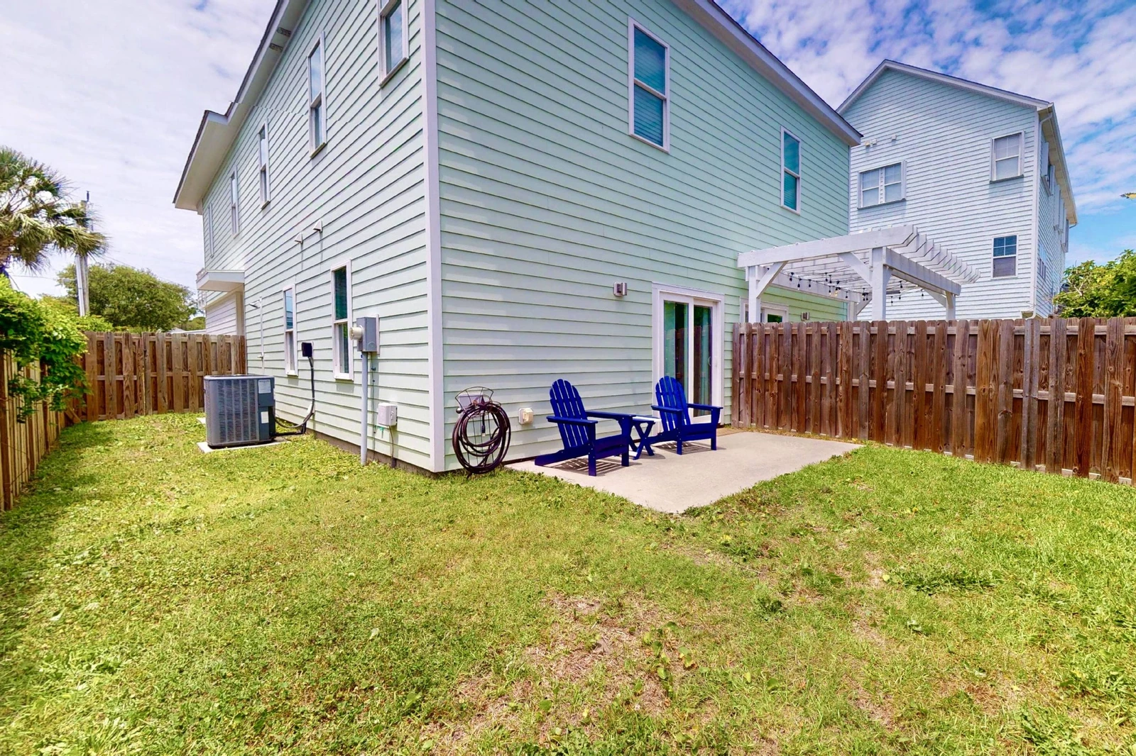 The fenced in yard is perfect for bringing your furry family members