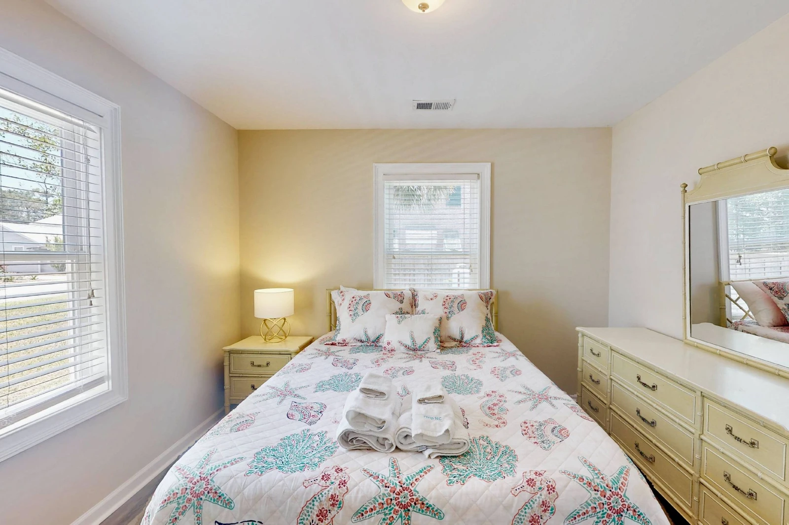 The second bedroom has a queen bed