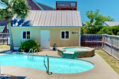 Relax around the pool on a hot day!  Tipsea Toes has a fenced in back yard for extra privacy (Spa and pool are not heated)