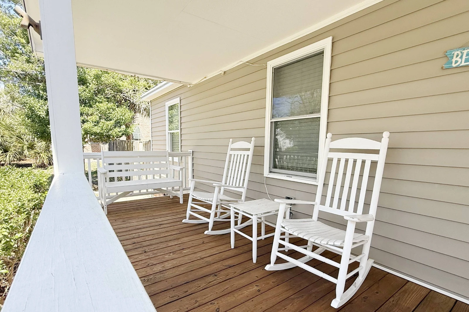Catch up on some reading on the front porch rocking chairs