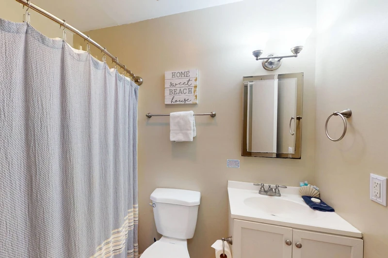 A full bathroom is located across from bedroom 2 and 3 for easy access