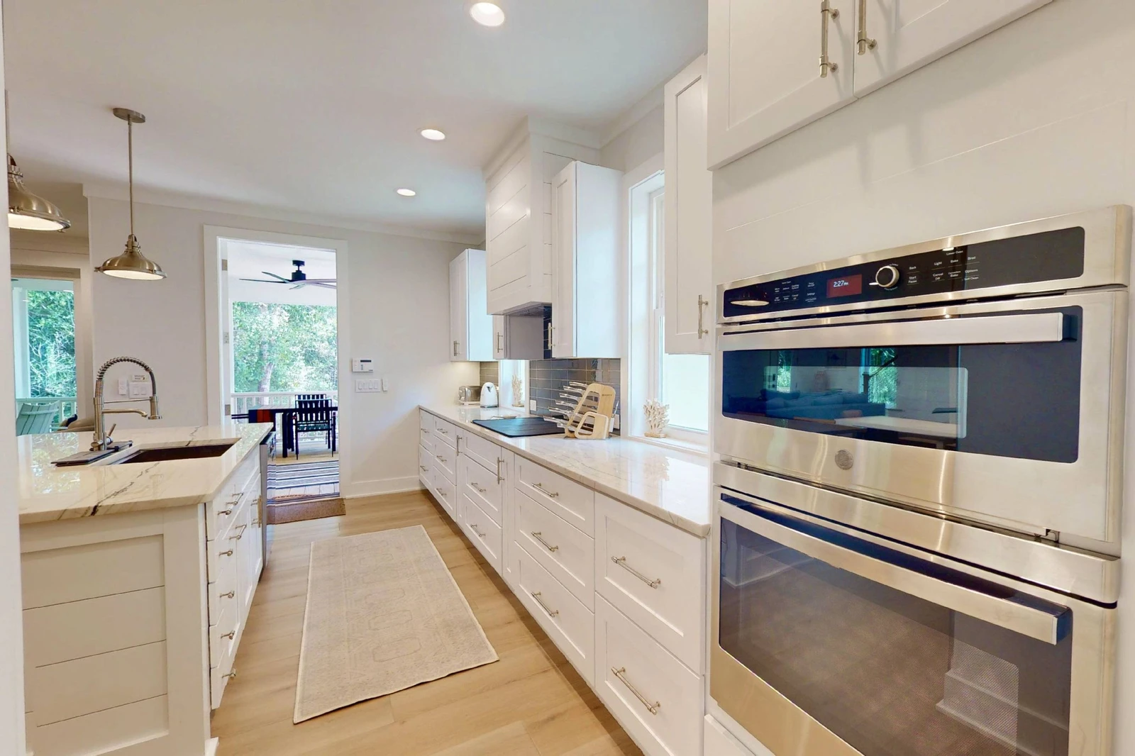 The kitchen features double convection ovens