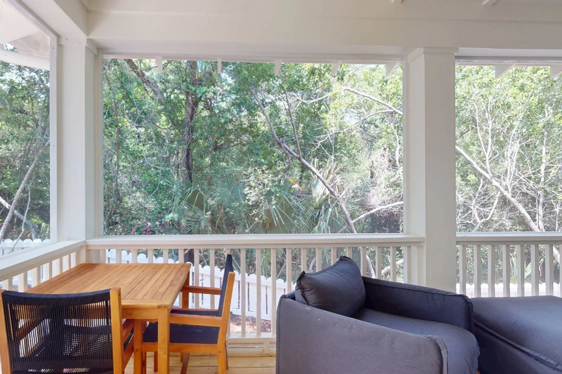 Multiple seating options are available on the porch