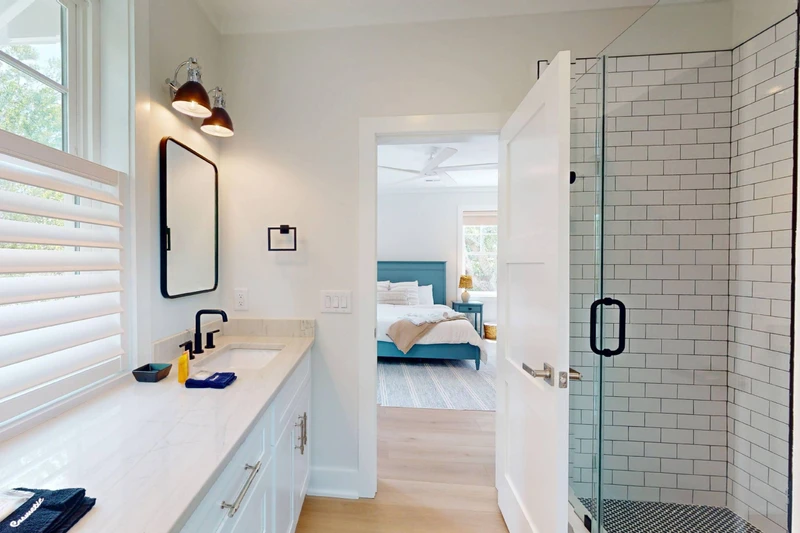 The upstairs ensuite features a large walk in tiled shower