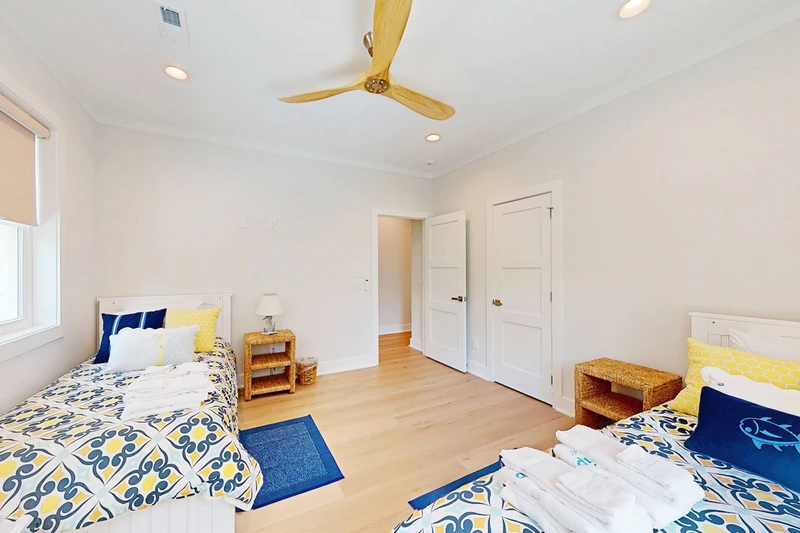 XL twin beds and trundles offer multiple sleeping options in this room
