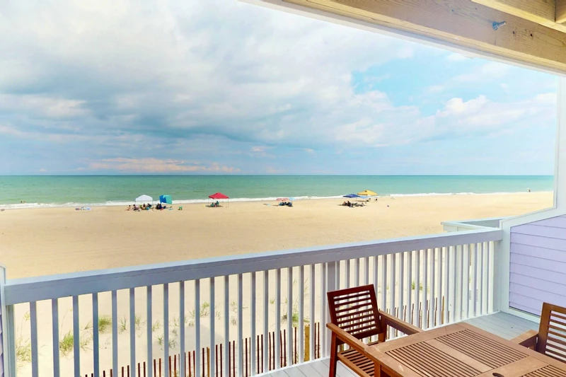 Relax on the beach just steps from your condo