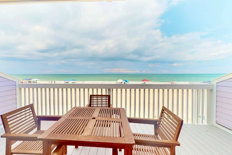 Enjoy a meal on the oceanfront deck