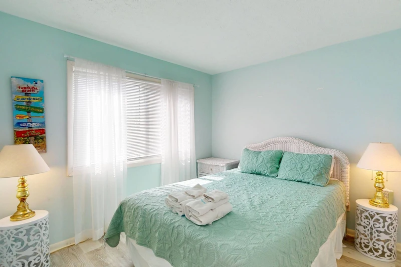 Bedroom 2 has a queen bed and is located on the 1st floor