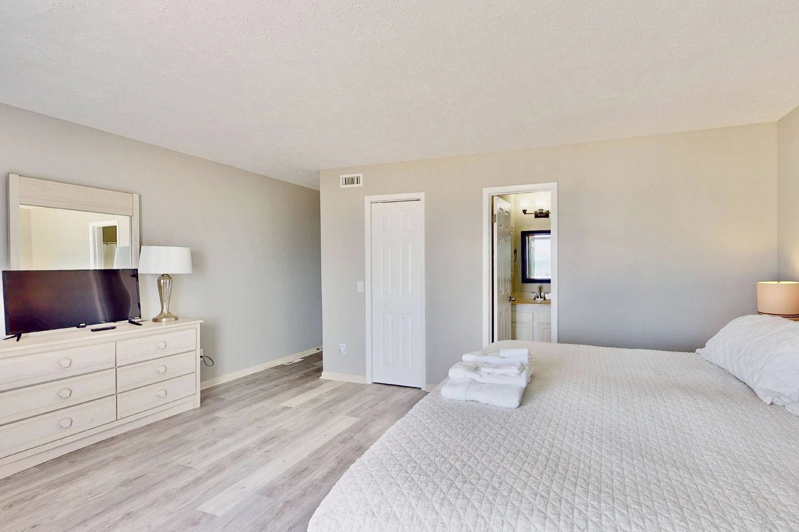 The owner's suite offers a flat screen tv and sitting area