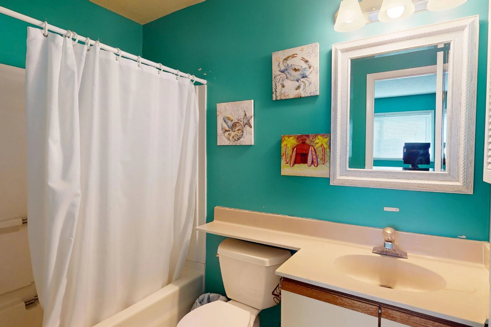 Bedroom 3's en-suite has a tub/shower combo