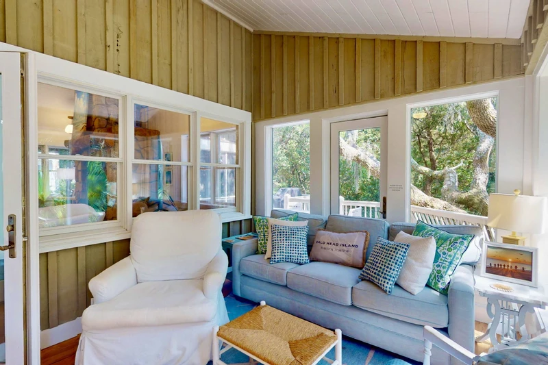 The family/dining room has windows on all sides for fantastic views