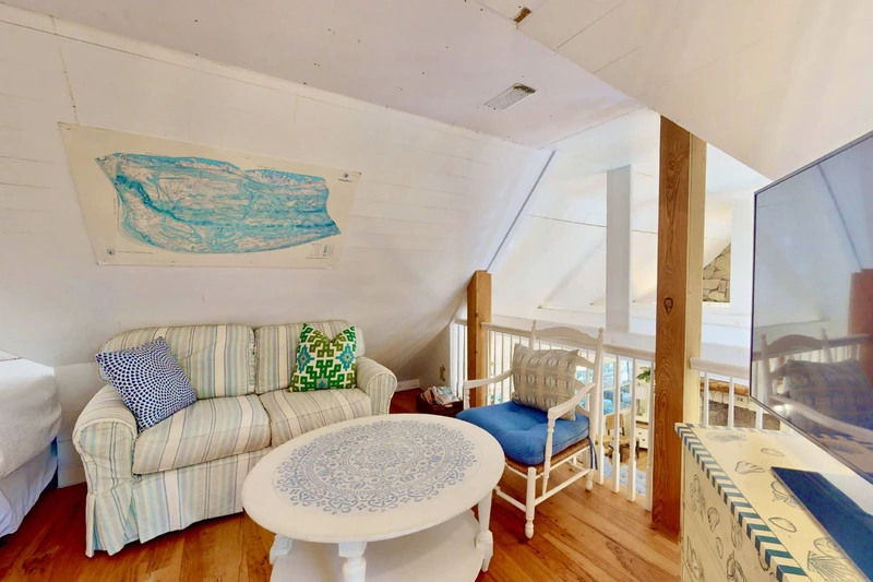 The loft features it's own sitting area and tv
