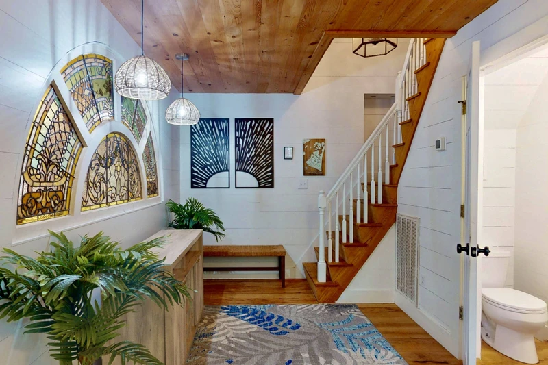 A half bathroom can be found between the kitchen and the owner's suite