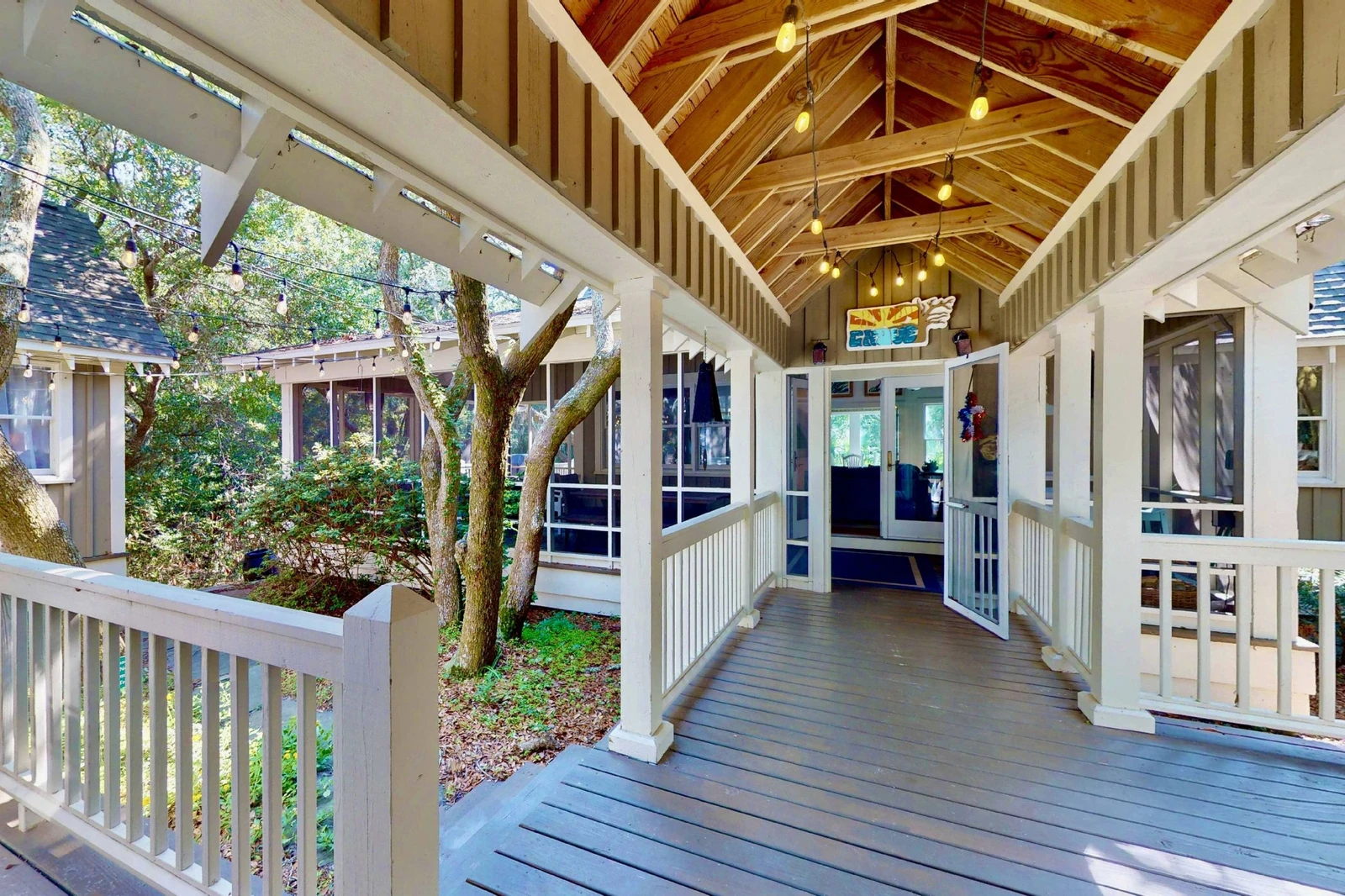A covered walkway connects the main house to the guest wing