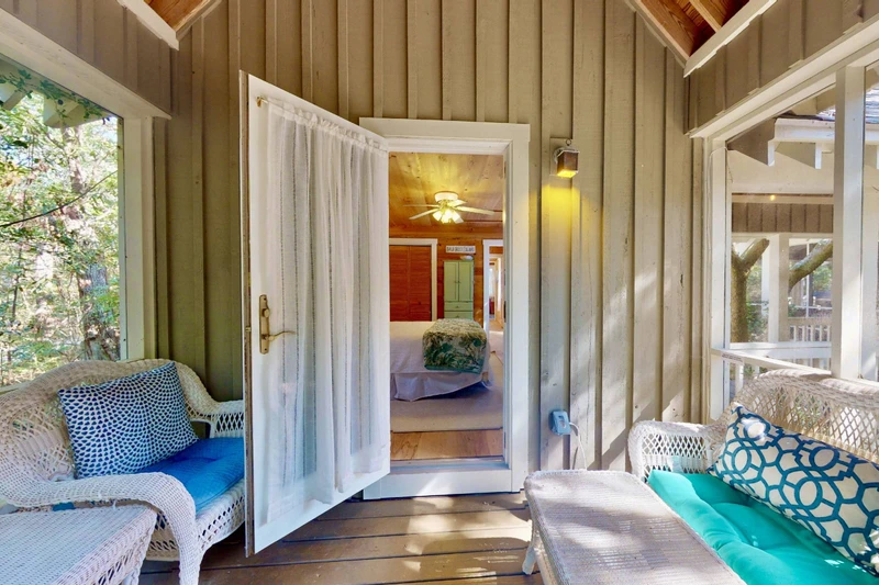 Private porch off the first queen in the guest wing