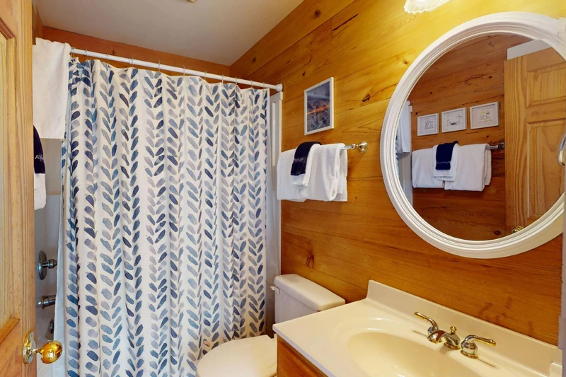 Guest wing full bathroom with a tub/shower combo