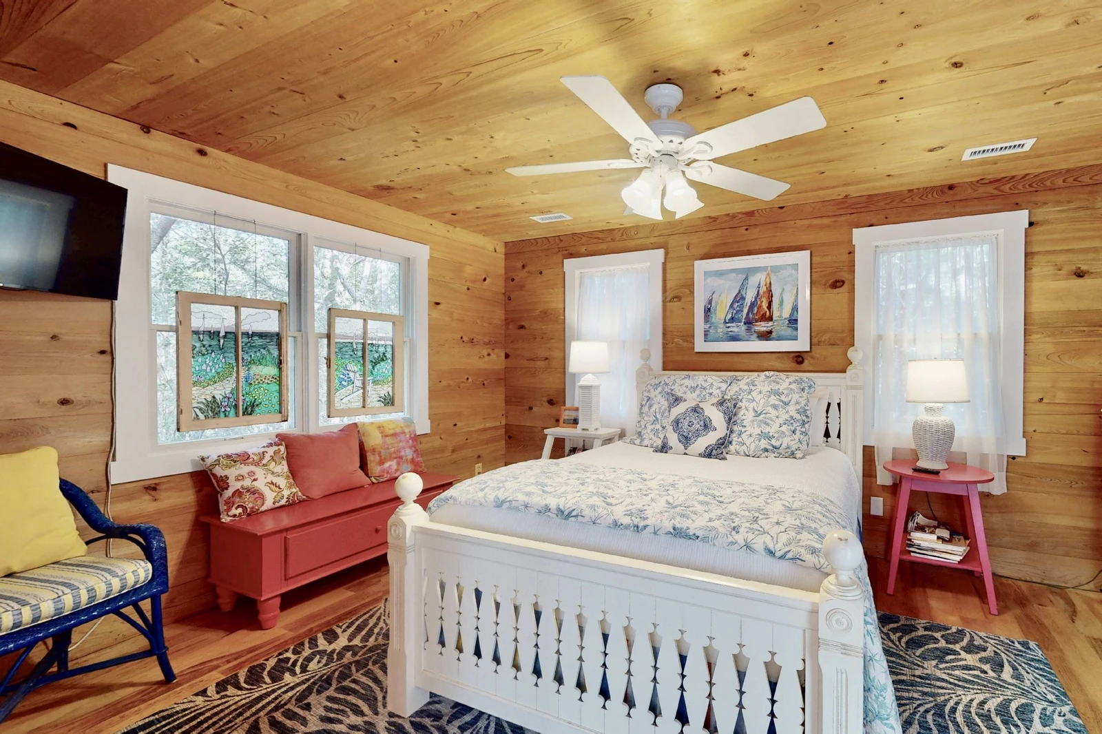 The second queen bedroom in the guest wing has a wall mounted tv and direct access to the double & twin bedroom - perfect for families with children