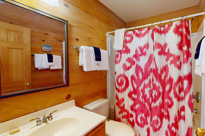 Second full hall bathroom with a tub/shower combo in the guest wing