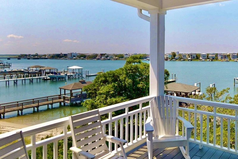 Watch the boats from the top floor deck