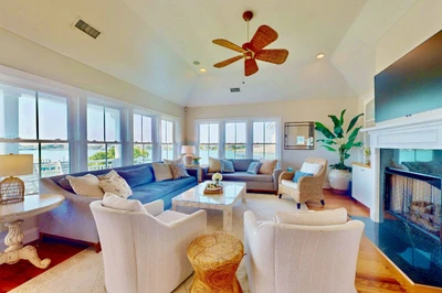 The living room has a large smart tv to catch the big game or your favorite show
