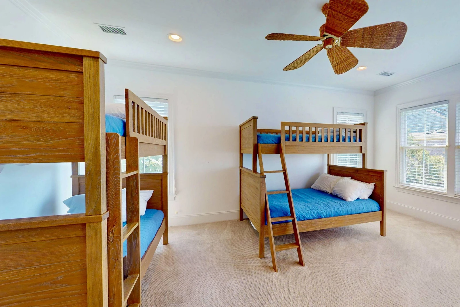 The bunk room has direct access to the second floor sound facing deck