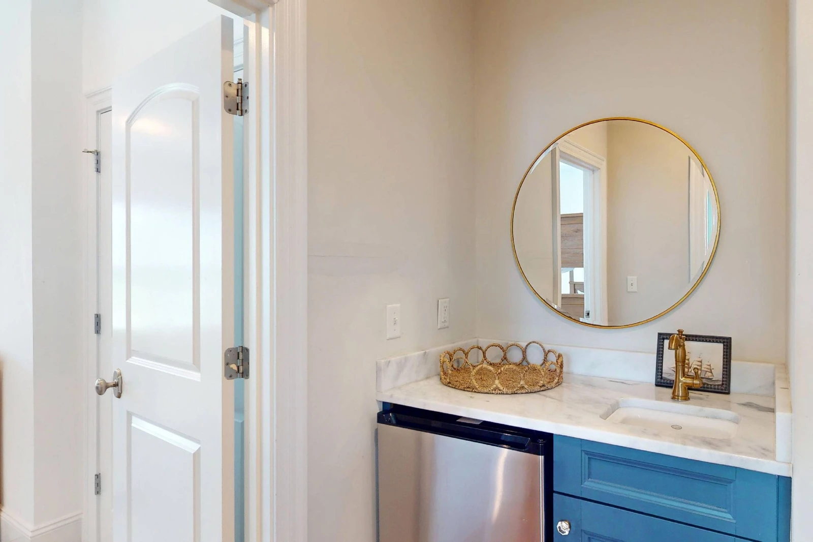 A wet bar on the second floor offers a mini fridge and sink