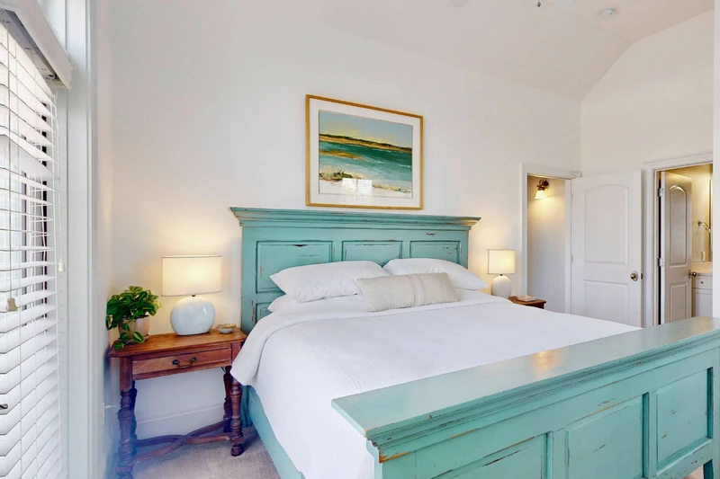 Bedroom 4 is located on the top floor with a king bed and full ensuite bathroom