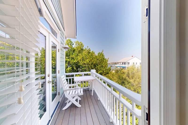 Top floor deck with peekaboo water views and direct access to bedrooms 4 & 5