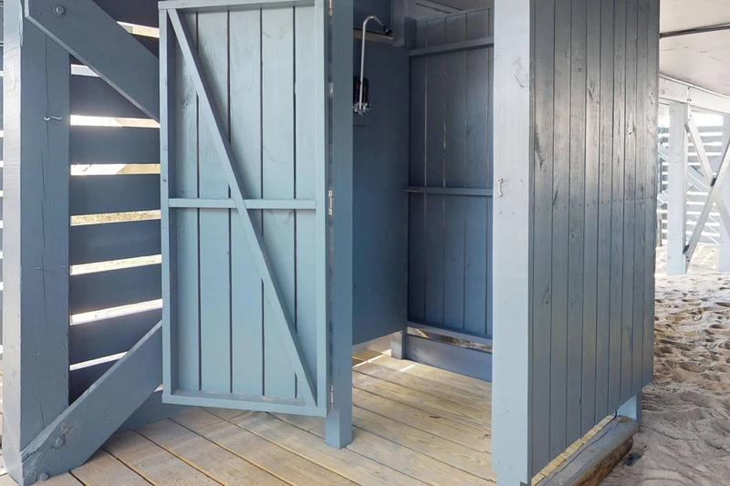 A private outdoor shower is perfect for rinsing off after a day at the beach
