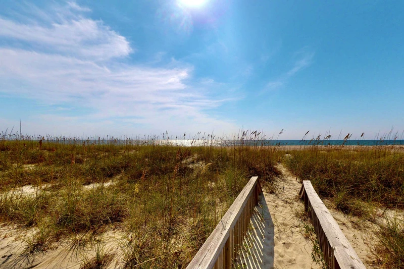 Enjoy a private walkway to the beach